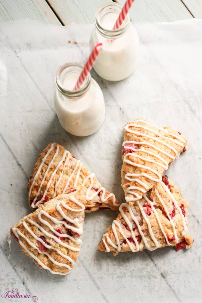 Bursting with fresh, juicy strawberries, these Strawberries and Cream Scones with Cream Cheese Glaze are perfect for breakfast or afternoon tea!