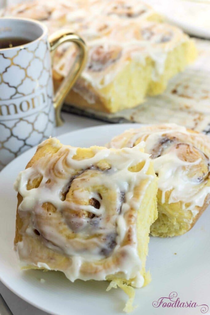 I'm in love with these Pumpkin Cinnamon Rolls with Pumpkin Butter and Cream Cheese Glaze! Made with a rich, pumpkin infused dough, filled with a scrumptious pumpkin butter, cinnamon sugar swirl, then topped with a smooth and luscious cream cheese icing, they are absolutely divine! 