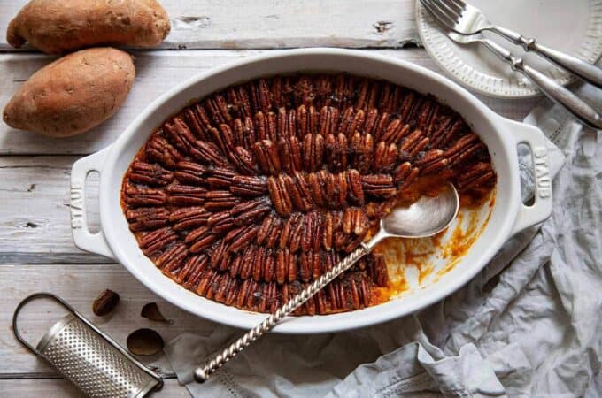 a dish of Sweet Potato Souffle with a spoonful taken out