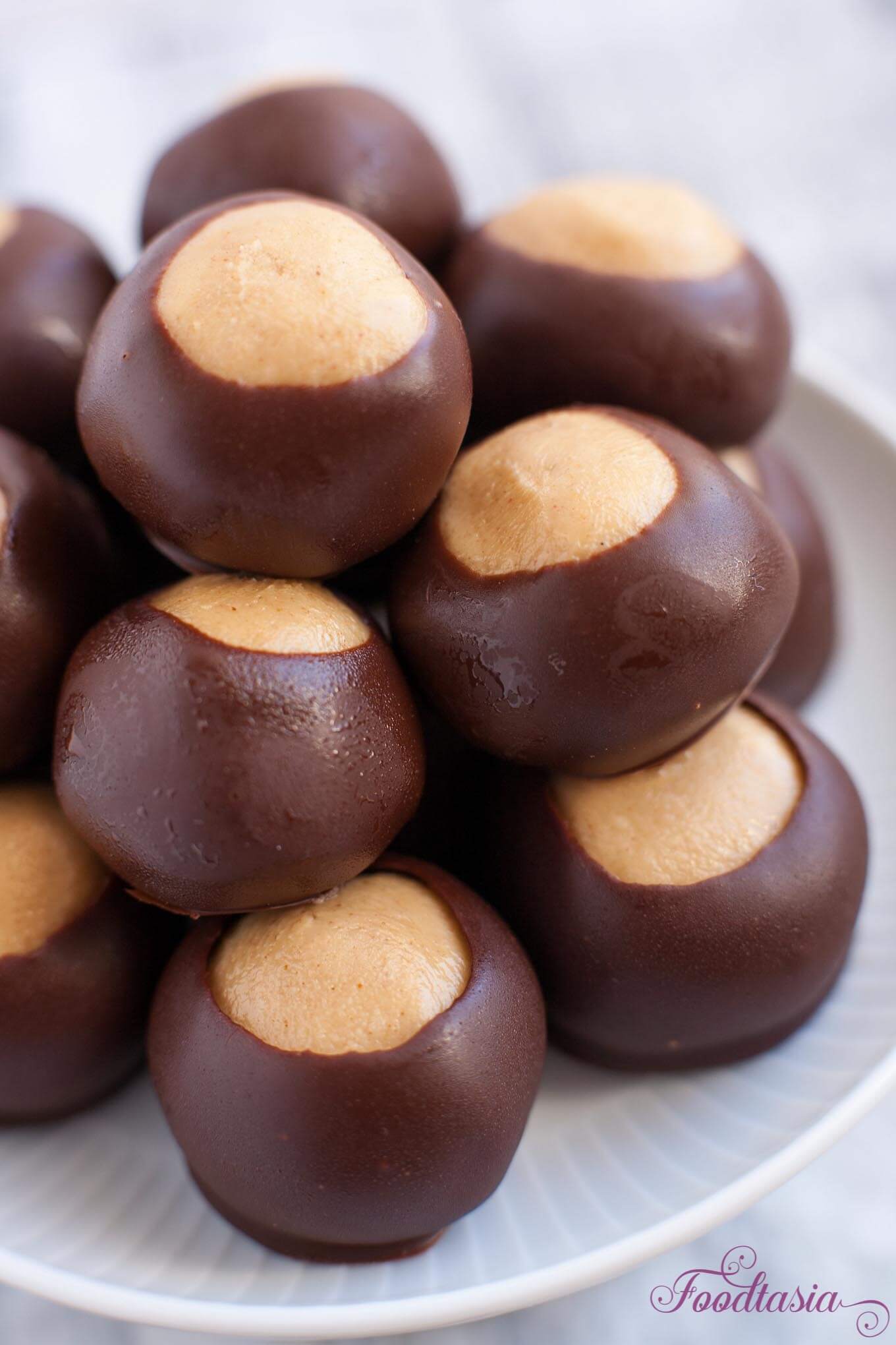 Buckeyes - Chocolate Dipped Peanut Butter Balls | Foodtasia