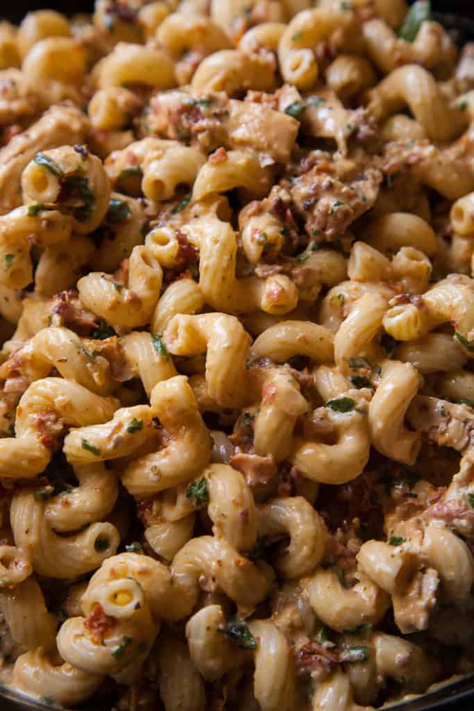 Pasta with Bacon, Sun-Dried Tomato and Mascarpone – Rich, creamy mascarpone fragrant with crispy bacon, savory sun-dried tomatoes, and aromatic fresh basil is tossed with a curly cavatappi and topped with sliced, grilled chicken breasts. A wonderfully delicious dish!