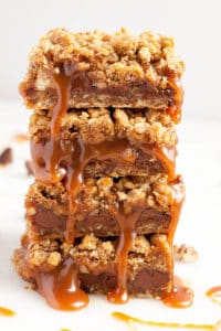 Chewy, gooey Salted Caramel Oatmeal Carmelitas – pockets of gooey, salted caramel oozing out from in between chunks of chocolate and crunchy pecans, all nestled in a brown sugar, oatmeal cookie crust and topped with an oatmeal streusel topping – Caramel Euphoria!