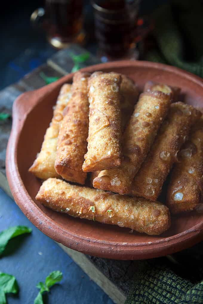 Cheese Sambousek - Crispy, chewy Middle Eastern cheese rolls filled with herbed Egyptian white cheese and mozzarella.