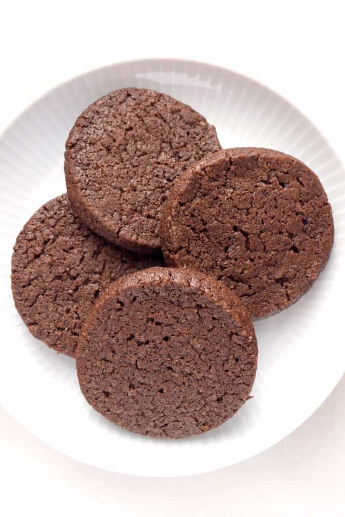 Crisp and chocolatey, but not overly sweet, these Homemade Chocolate Wafers are a copycat of Nabisco Famous Chocolate Wafers but so much better. Essential for chocolate cookie crumb crusts and perfect with a glass of milk or a cup of coffee. 