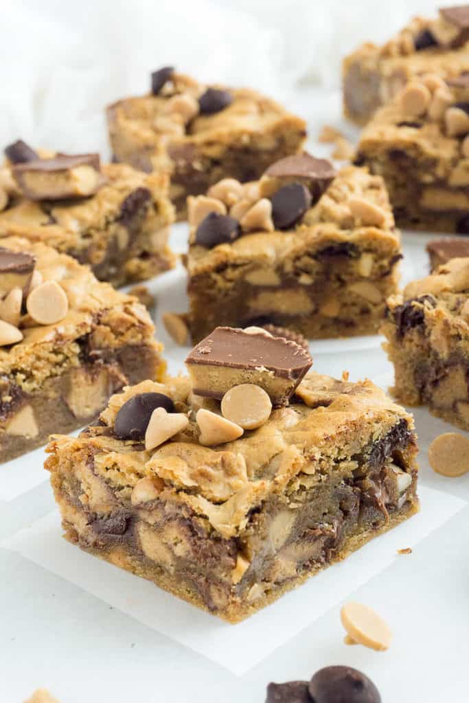 These Chunky, Chewy Peanut Butter Bars are so over the top! I packed in 18 (Eighteen!) full size Reese's peanut butter cups, peanut butter flavored chips, semi-sweet chocolate chips, and chunky peanut butter into a moist, chewy peanut butter bar. Extravagant? Definitely! But so delicious!