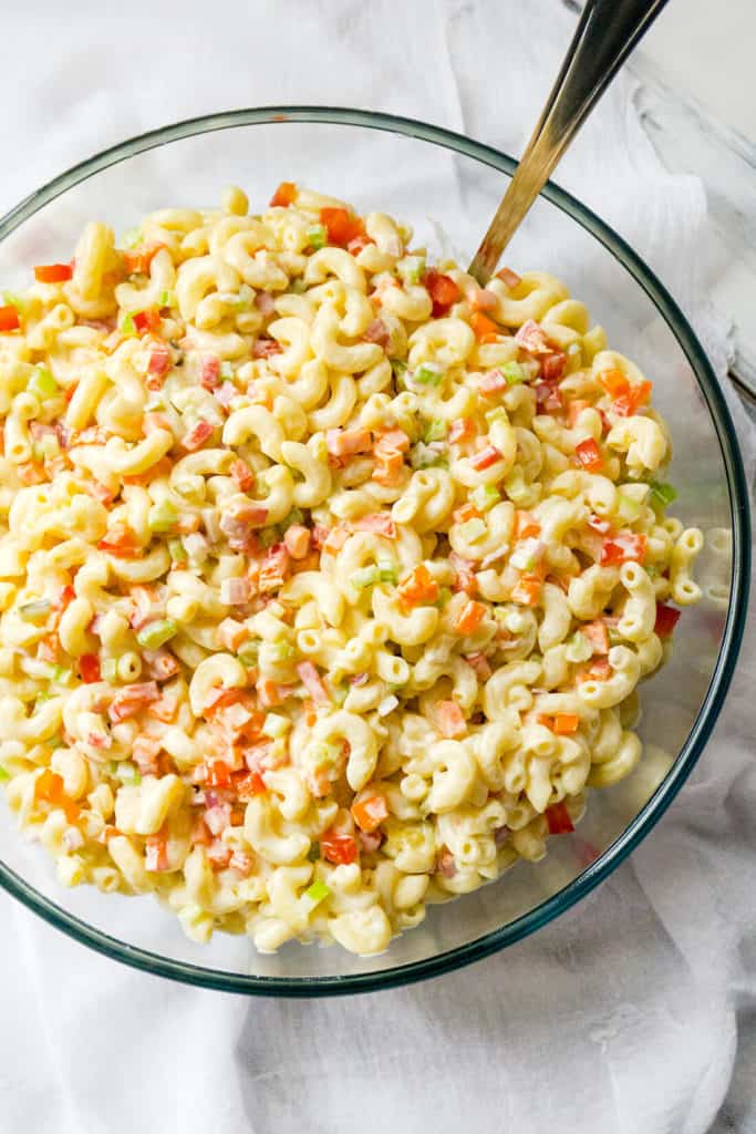 Here are my secrets to the best Classic Macaroni Salad is the best - ever! You'll never know it's lightened up because it tastes even better than the original. Lots of colorful, crunchy veggies, a fresh, creamy dressing, and the perfect balance of sweet and tangy. Perfect for summertime barbecues and picnics!
