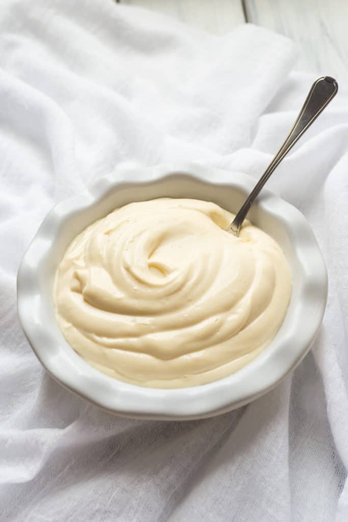 There’s such a thrill in watching a couple of raw eggs, seasonings, and oil turn into a fluffy white cloud of mayonnaise in your blender. This quick and easy Foolproof Homemade Mayonnaise recipe will give you the best tasting mayonnaise in two minutes flat.