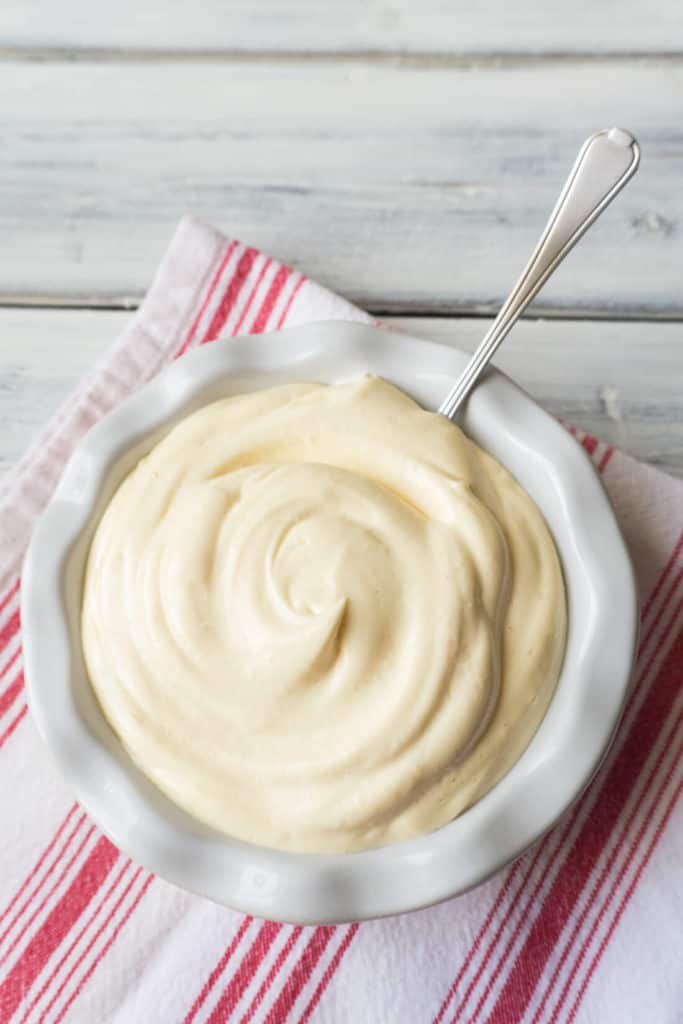 There’s such a thrill in watching a couple of raw eggs, seasonings, and oil turn into a fluffy white cloud of mayonnaise in your blender. This quick and easy Foolproof Homemade Mayonnaise recipe will give you the best tasting mayonnaise in two minutes flat.