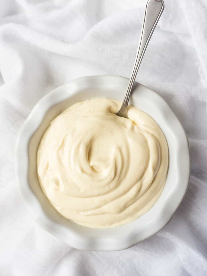 There’s such a thrill in watching a couple of raw eggs, seasonings, and oil turn into a fluffy white cloud of mayonnaise in your blender. This quick and easy Foolproof Homemade Recipe will give you the best tasting mayonnaise in two minutes flat.