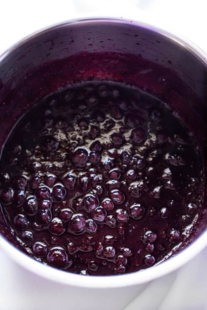 This Blueberry Sauce, or Blueberry Coulis, is a silky smooth and vibrant sauce made of fresh or frozen blueberries. Sweet, tangy, and intensely blueberry, it's a perfect topping for cheesecake, cakes, pancakes, waffles, or ice cream. 
