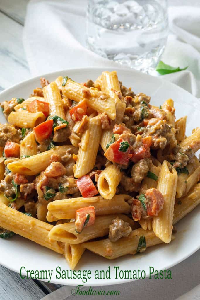 Italian sausage, sundried tomatoes, and red pepper in a creamy, cheesy sauce, this Creamy Italian Sausage and Tomato Pasta is quick and easy, and it tastes amazing. It's sure to be your new go-to dinner on busy weeknights. A family favorite!