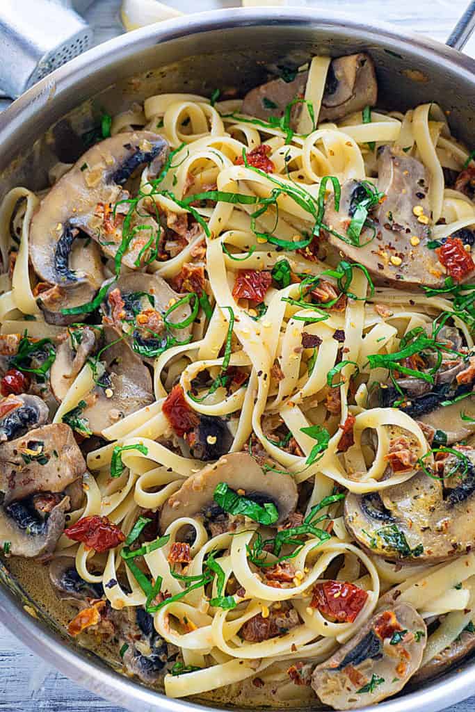 Pasta tossed with sun-dried tomatoes and sautéed mushrooms in a creamy, cheesy sauce fragrant with garlic and basil, this Sun-Dried Tomato and Mushroom Pasta is sure to become a family favorite. Quick and easy to make, it's perfect for a weeknight dinner. 