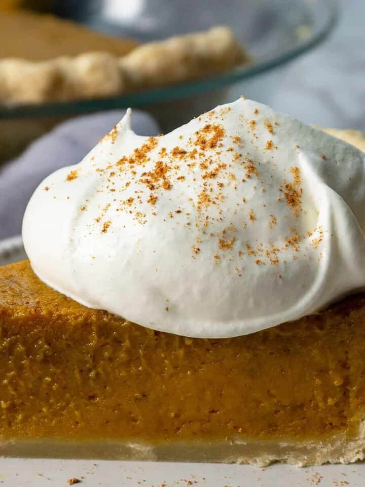 Winner of the Pumpkin Pie Challenge. Discover the secret to the Best Pumpkin Pie Recipe that's ultra-silky smooth with the deepest, richest pumpkin flavor. #pumpkin #pumpkinrecipes #pumpkinspice #thanksgiving #thanksgivingrecipes #falldesserts