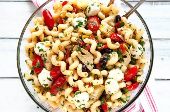 Everyone loves this Easy Italian Antipasto Pasta Salad! It’s filled with the delicious flavors of your favorite Italian antipasto tossed with a homemade dressing. My go-to recipe for a quick meal, picnic, or potluck.