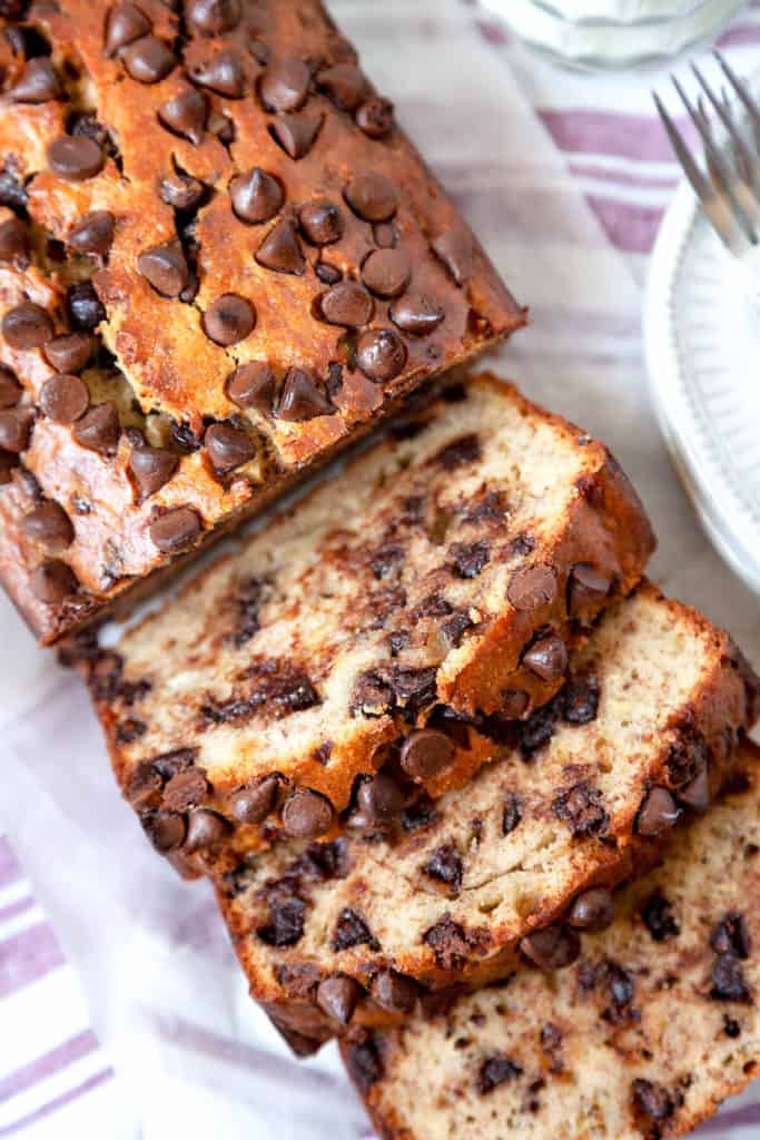 This simply irresistible Chocolate Chip Banana Bread is the best I’ve ever had. It’s light and fluffy, perfectly moist, and full of banana flavor. #bananabread #banana #loaf #quickbread #breakfast #chocolate #chocolatechip #brunch #easy #quick #recipe