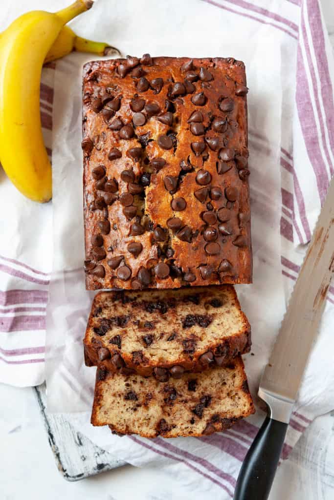 This simply irresistible Chocolate Chip Banana Bread is the best I’ve ever had. It’s light and fluffy, perfectly moist, and full of banana flavor. #bananabread #banana #loaf #quickbread #breakfast #chocolate #chocolatechip #brunch #easy #quick #recipe
