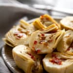 Ready in 5 minutes! You won’t believe how easy and how delicious these Easy Marinated Artichoke Hearts are! #artichokes #artichokehearts #marinated #italian #recipe #appetizer #antipasto #salad #food #easy #quick #homemade #5minute