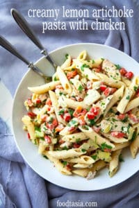This Creamy Lemon Artichoke Pasta with Chicken, red peppers, and parsley has a bright, delicate lemon flavor in a creamy, garlicky parmesan sauce. An easy and flavorful one dish meal. Restaurant quality in under 30 minutes. #pasta #artichoke #quick #easy #chicken #dinner #creamy #redpepper #lemon #under30minutes #datenight