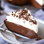 Chocolate Cream Pie is the ultimate creamy, dreamy, decadent dessert. With an Oreo cookie crust, a velvety smooth chocolate custard filling, and billows of whipped cream, this Chocolate Cream Pie will leave you swooning! #chocolate cream pie #chocolate #pie #dessert #best #homemade #no bake #recipe #from scratch #oreo #video