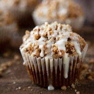 Pumpkin Streusel Muffins – a light, tender pumpkin muffin topped with the most amazing buttery, brown sugar, pumpkin spice streusel and an easy vanilla glaze. #muffins #pumpkin #streusel #crumb #quick #easy #from scratch #recipe #breakfast #cake #snack #bakery style #video