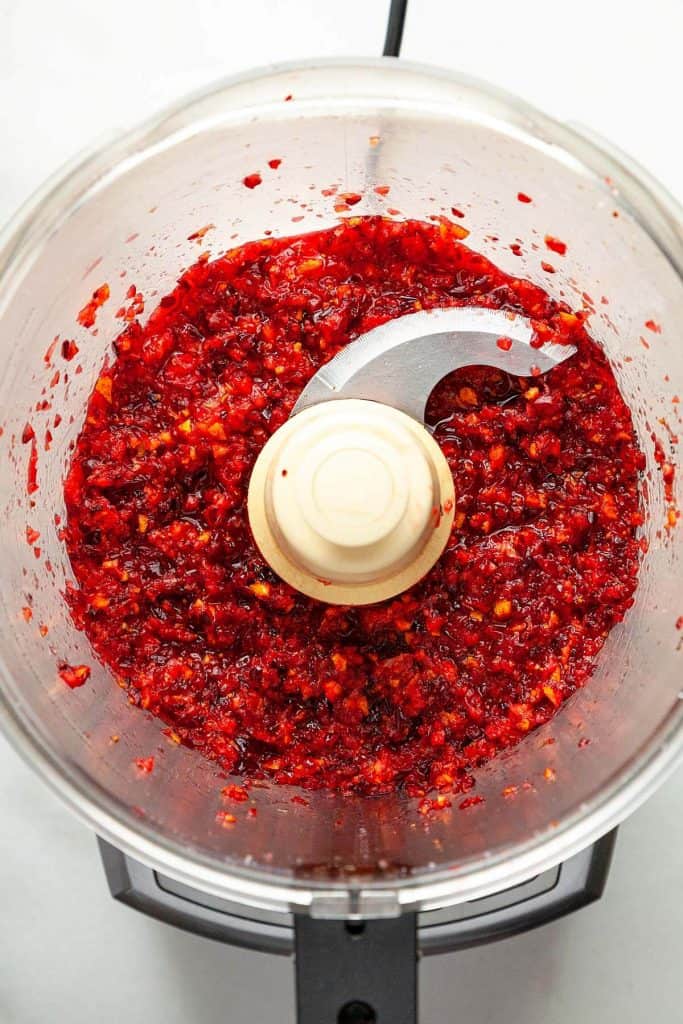 This easy Cranberry Orange Relish is fresh, vibrant, and easy to make with only three ingredients! A must-have for our holiday meals! #cranberry #relish #orange #sauce #Thanksgiving #easy #quick #fresh #recipe