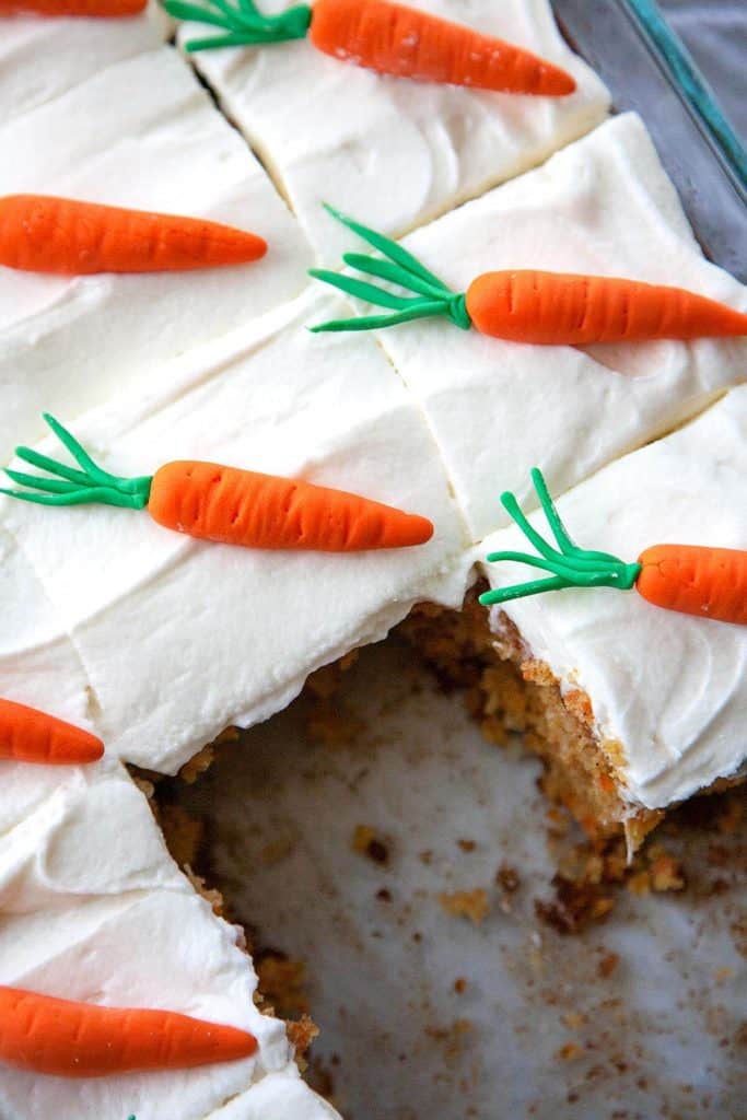 Incredibly moist and so delicious! This is my favorite Carrot Cake recipe – a super moist and tender Carrot Cake bursting with flavor from pineapple and coconut, topped with the most heavenly cream cheese frosting. #easy #best #recipe #healthy #homemade #cupcakes #decoration #pineapple #creamcheesefrosting #dessert #spring #easter
