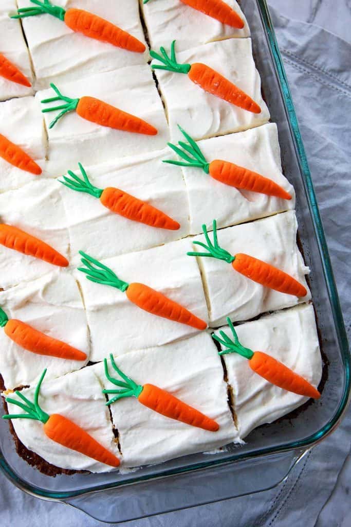 Incredibly moist and so delicious! This is my favorite Carrot Cake recipe – a super moist and tender Carrot Cake bursting with flavor from pineapple and coconut, topped with the most heavenly cream cheese frosting. #easy #best #recipe #healthy #homemade #cupcakes #decoration #pineapple #creamcheesefrosting #dessert #spring #easter
