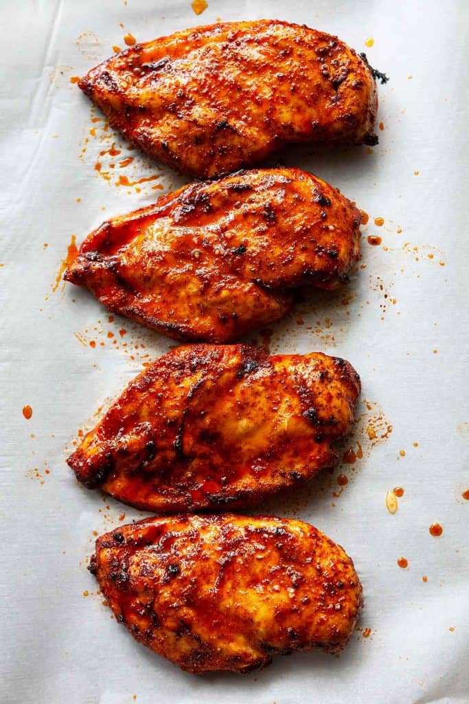 Baked Cajun Chicken Breasts are easy to cook and incredibly JUICY! Forget dry chicken with this tender, succulent oven baked chicken breast recipe!