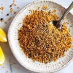 Easy Homemade Lemon Pepper Seasoning - with its bright citrus tang and its zingy peppery flavor - is my favorite seasoning for all things chicken and fish. So much better and cheaper than store bought.