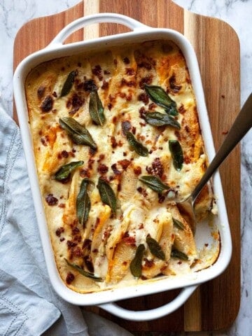 Butternut Squash Stuffed Shells with Bacon and Crispy Sage - pasta shells with a butternut squash and mascarpone filling, baked in a parmesan cream sauce, topped with bacon and crispy sage.