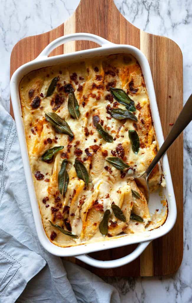 Butternut Squash Stuffed Shells with Bacon and Crispy Sage - pasta shells with a butternut squash and mascarpone filling, baked in a parmesan cream sauce, topped with bacon and crispy sage.