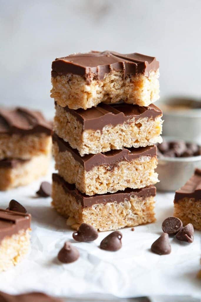 chocolate covered rice krispie treats cut into bars and stacked on top of each other