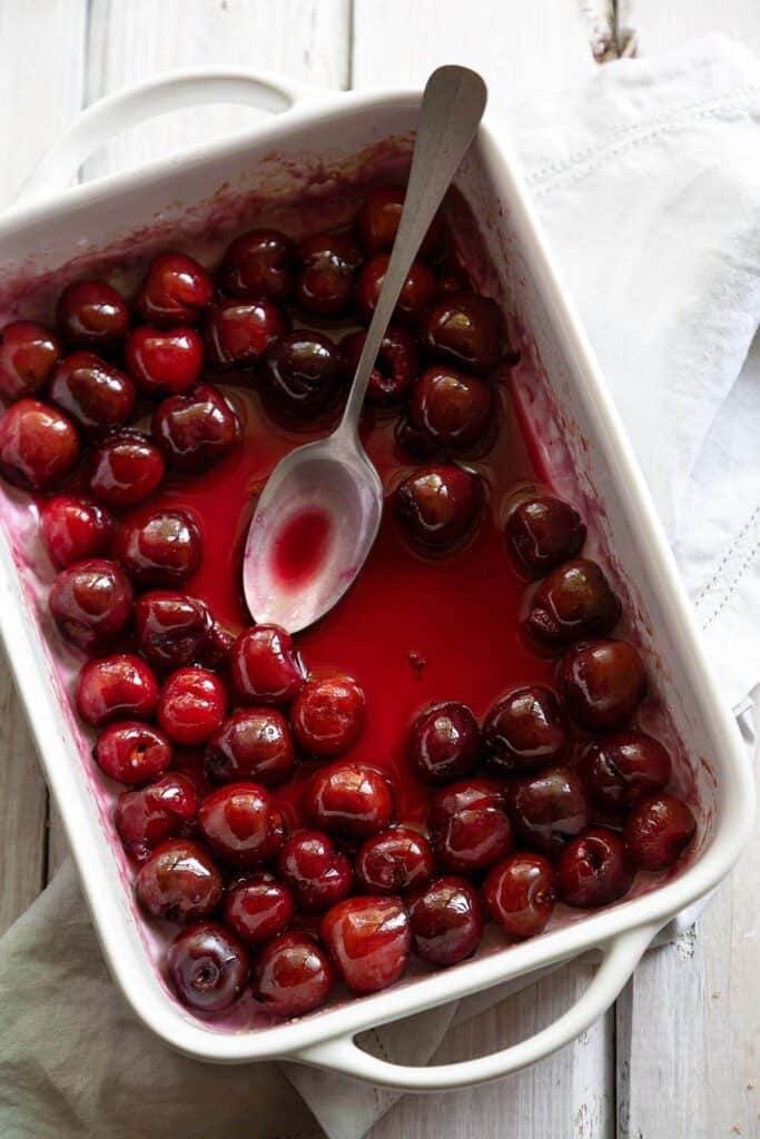 baking dish with roasted cherry sauce