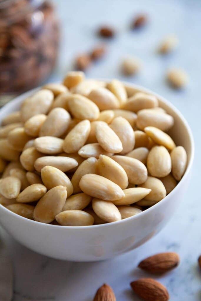 bowl of skinless whole almonds